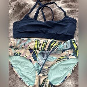Calia by Carrie Underwood Tropical Leaf Bikini bottoms with blue top.